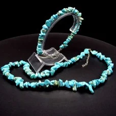 A set of beads and a bracelet on a fishing line with a lock made of natural stone Turquoise
