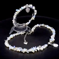 A set of choker and bracelet with a pendant made of natural stone Moonstone