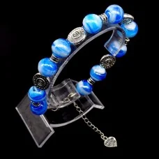 Glass beads bracelet. Diameter -12mm, color blue. The basis of the bracelet is a double strong fishing line with a lock, accessories - metal in silver, girth: 20cm+