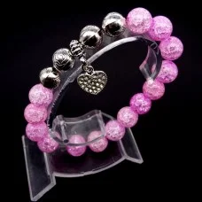 Bracelet on an elastic band made of natural stone "Quartz" with a pendant, metal fittings in silver. Bead diameter: 10/10mm, girth: 19cm+