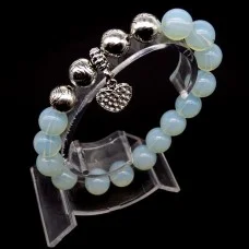 Bracelet on an elastic band made of natural stone "Moonstone" with a pendant, metal fittings in silver. Bead diameter: 10/10mm, girth: 19cm+
