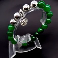 Bracelet on an elastic band made of natural stone "Jade" with a pendant, metal fittings in silver. Bead diameter: 10/10mm, girth: 19cm+