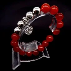 Bracelet on an elastic band made of natural stone "Carnelian" with a pendant, metal fittings in silver. Bead diameter: 10/10mm, girth: 19cm+