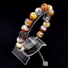 Glass beads bracelet. Diameter -12mm, color-brown. The basis of the bracelet is a double strong fishing line with a lock, accessories - metal in silver, girth: 20cm+