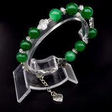 Bracelet made of natural stone "Jade" metallized thread, silver metal fittings. Bead diameter: 10mm, girth: 19cm+