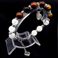 Bracelet made of natural stone "Tiger Eye-Rhinestone" with a pendant. Metallic thread, silver metal fittings. Bead diameter: 10mm, girth: 19cm+