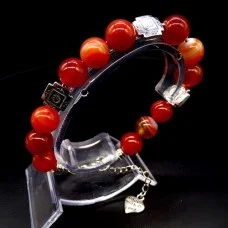 Bracelet made of natural stone "Carnelian" metallized thread, silver metal fittings. Bead diameter: 10mm, girth: 19cm+