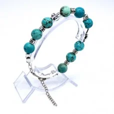 Natural stone bracelet *Turquoise* Metallized thread base. Bead diameter: 10mm, girth: 19.5cm+