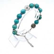 Natural stone bracelet *Turquoise* Metallized thread base. Bead diameter: 10mm, girth: 19.5cm+