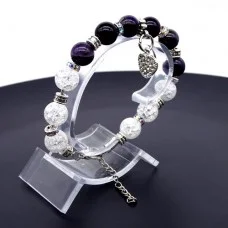 Bracelet made of natural stone *Amethyst-Rock Crystal* with a pendant, the base is a metallized thread. Bead diameter: 10mm, girth: 19cm+