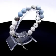Bracelet made of natural stone *Blue Agate-Rock Crystal* metalized thread base. Bead diameter: 10mm, girth: 19cm+