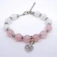 Bracelet made of natural stone *Rose Quartz-Rock Crystal* with a pendant, the base is a metallized thread. Bead diameter: 10mm, girth: 19cm+