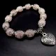 Natural stone bracelet *Rose quartz* with elastic, diameter: 10mm, girth: 19cm