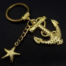 Брелок морський світ у вигляді якоря та морської зірки колір металу золото, розмір: довжина-9см, підвіска: 4.5/3.6см-2.3/1.9см