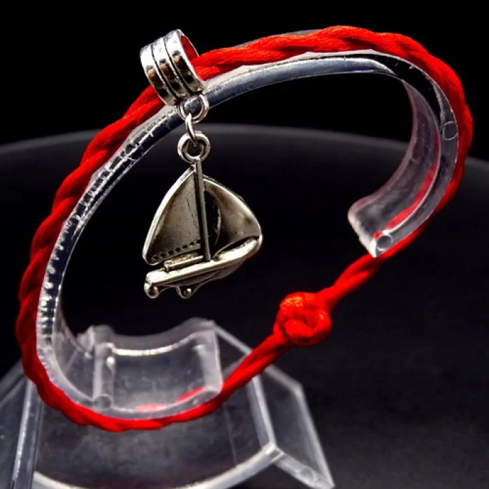 Bracelet red thread amulet against the evil eye with a pendant *sailboat* metal color: silver, size: universal 12-19cm