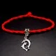 Bracelet red thread amulet against the evil eye with a pendant *Two Dolphins* metal color: silver, size: universal 12-19cm