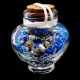 Marine souvenir glass bottle in the shape of a heart