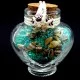 Marine souvenir glass bottle in the shape of a heart