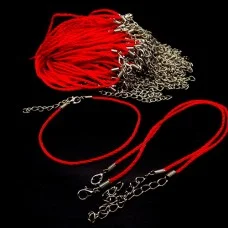 Red thread bracelet with a clasp amulet against the evil eye